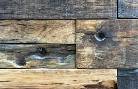 Texture of dark aged wood. Panel with rough boards for wall decor. Stock Photos
