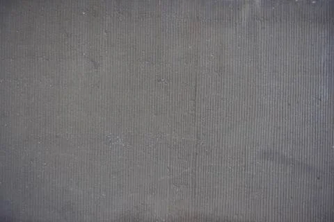 Texture of a dark concrete wall Stock Photos