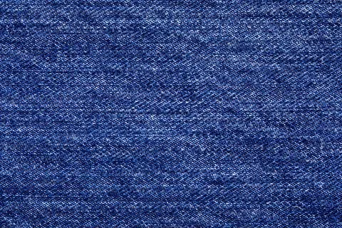 Texture of dark denim closeup Stock Photos