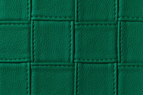 Texture of dark green leather background with square pattern and stitch, macr Stock Photos