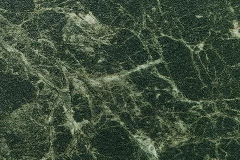 Texture of dark green marble for tabletop with olive lines of a pattern, macr Stock Photos