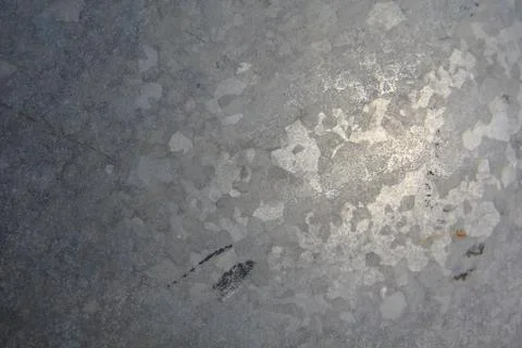 Texture of dark grey marble with a crack in the corner Stock Photos