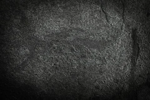 Texture of dark grey stone surface as background, closeup Stockfoto's