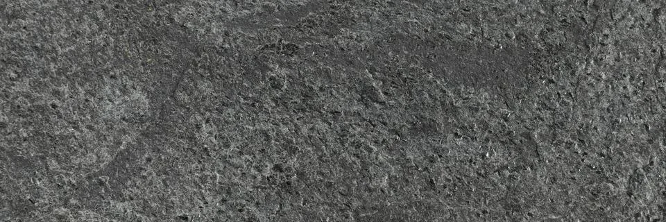 Texture of dark grey stone surface as background, closeup. Banner design Stockfoto's