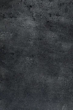 Texture of dark grey stone surface as background, closeup Stock Photos