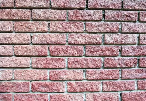 Texture of dark pink brick wall texture with light Stock Photos