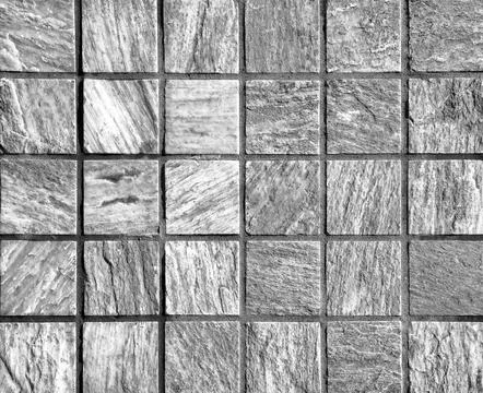 Texture of a decorative brick-like tiles. Abstract background for design. Stock Photos