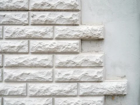 Texture of decorative brickwork, tiles on the wall Stock Photos
