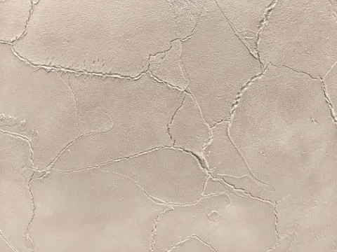 Texture decorative bronze plaster imitating the old peeling wall. Stock Photos