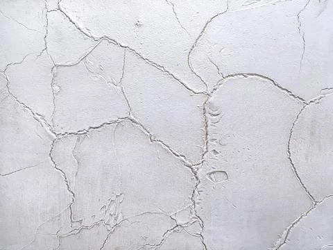 Texture decorative gray plaster imitating the old peeling wall. Stock Photos