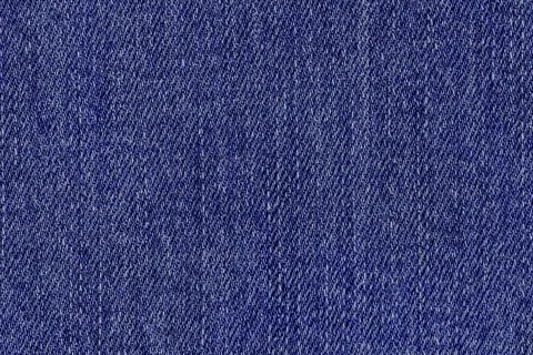 Texture denim background.Surface of blue fabric,wallpaper Stock Photos