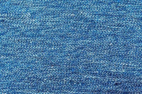Texture of dense blue fabric for tailoring. Canvas. Textile. Textile Stock Photos