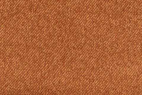 Texture of dense brown fabric for tailoring. Canvas. Textile. Material Stock Photos