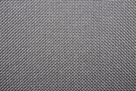 The texture of a dense gray carpet.The texture of gray woolen fabric. Stock Photos