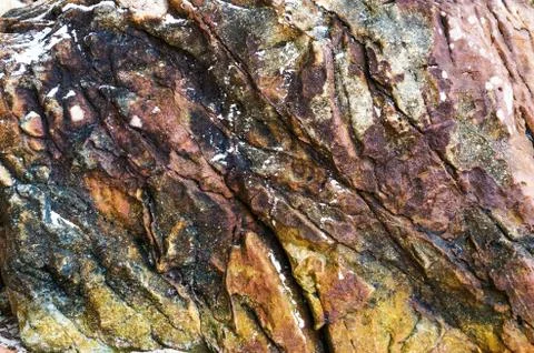 Texture for design with stone rock with cracks. Stock Photos