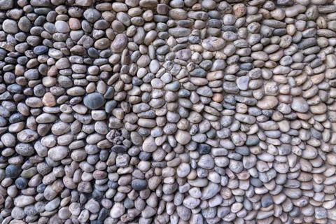 Texture detail of a wall with a surface composed of stones Stock Photos