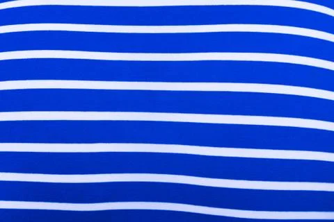 Texture of a developing fabric in a blue white stripe Stock Photos