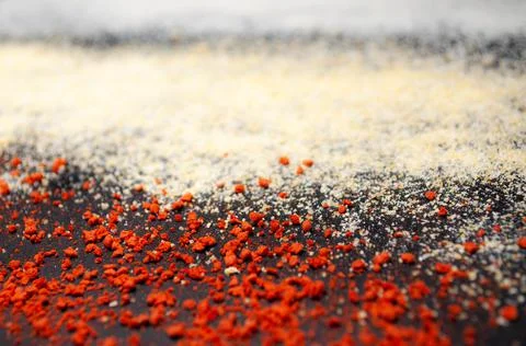 Texture of different spices on a black background Stock Photos