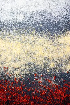 Texture of different spices on a black background Stock Photos