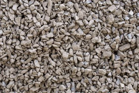 The texture of dirty rubble. Background of small stone covered with mud 写真素材