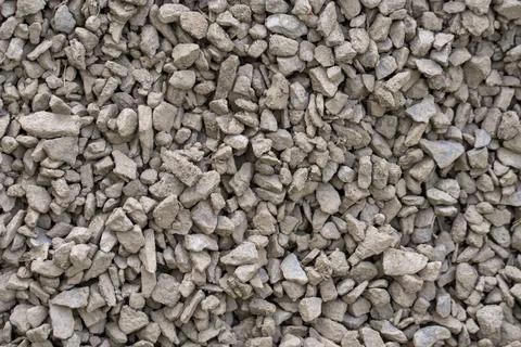 The texture of dirty rubble. Background of small stone covered with mud 写真素材