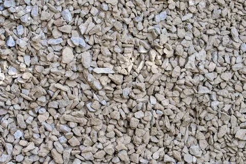 The texture of dirty rubble. Background of small stone covered with mud 写真素材