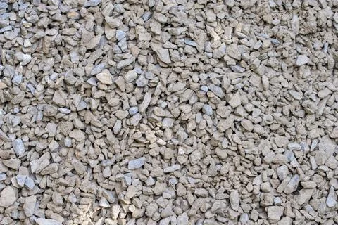 The texture of dirty rubble. Background of small stone covered with mud 写真素材