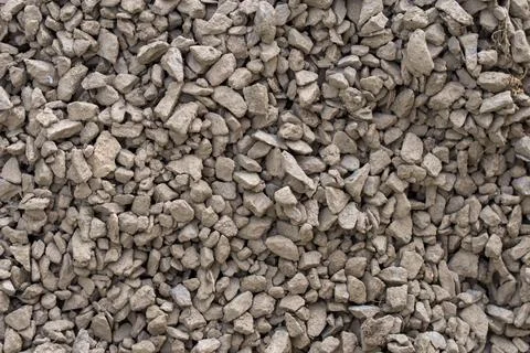 The texture of dirty rubble. Background of small stone covered with mud 写真素材