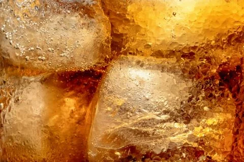 The texture of the drink with ice close-up Stock Photos