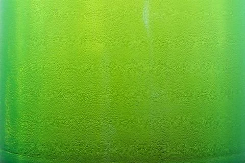 Texture drops on a beer bottle Stock Photos