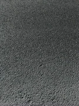 Texture of dry asphalt on the road. Stock Photos