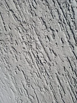 The texture of  dry gray plaster Stock Photos