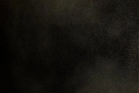 Texture of dust in the wind over black background Stock Photos