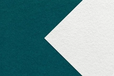Texture of emerald paper background, half two colors with white arrow, macro. Stock Photos