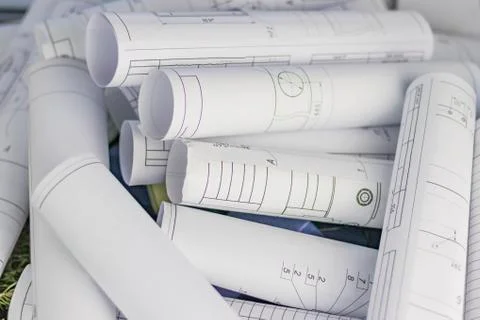 Texture. engineering plans twisted into a roll. close-up Stock Photos