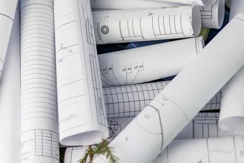 Texture. engineering plans twisted into a roll. close-up Stock Photos