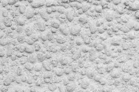 Texture of expanded clay stones and concrete wall Stock Photos