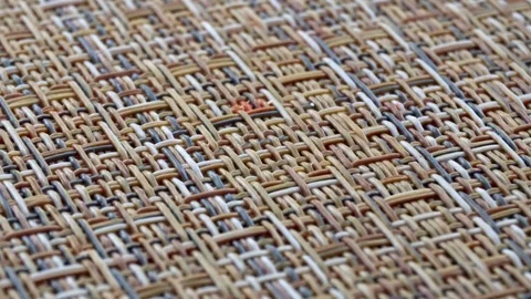 The texture of the fabric. Beige wicker fabric. Close-up. Stock Footage 111564172