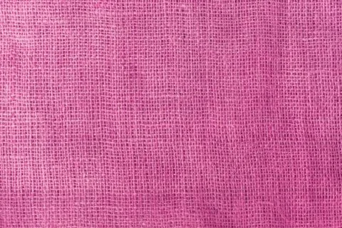 Texture fabric burlap for sewing red background color macro Stock Photos