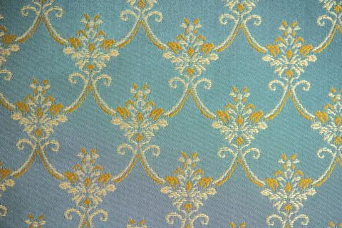 The texture of the fabric, large pattern yellow on green background Stock Photos