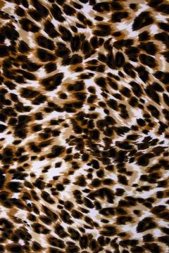 Texture fabric of leopard skin for background Stock Photos