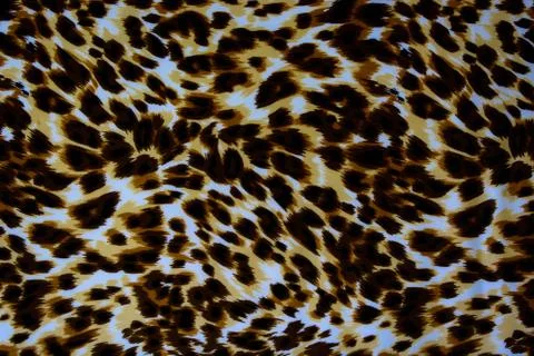 Texture fabric of leopard skin for background Stock Photos