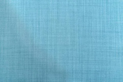 The texture of the fabric is light blue. Linen material. Textile Stock Photos