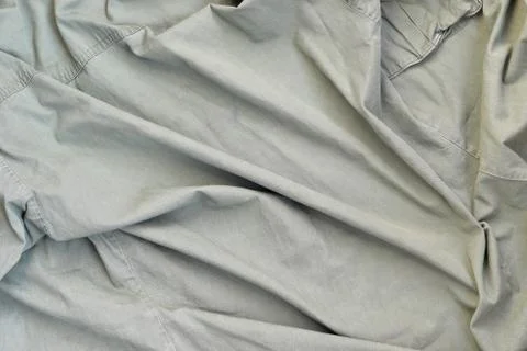 The texture of the fabric is olive-colored, which is similar to the uniform o Fotos de archivo