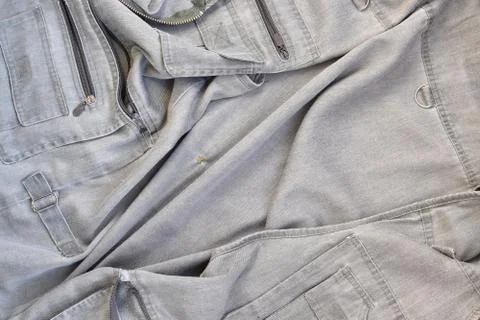 The texture of the fabric is olive-colored, which is similar to the fisherman Stock Photos