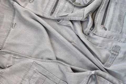 The texture of the fabric is olive-colored, which is similar to the fisherman Stock Photos
