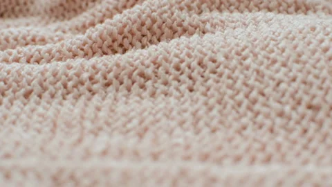 The texture of the fabric. Pink knitted texture. Vídeo Stock 102891023