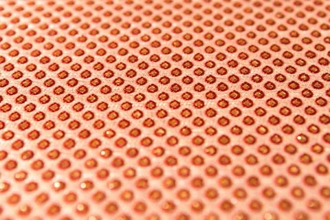 Texture of the fabric, side, background of fabric in the highlight. golden color 库存照片