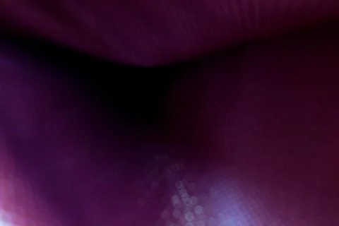 Texture of the fabric, side, background of fabric in the highlight. lilac color Stock Photos