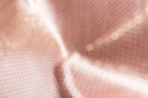 Texture of the fabric, side, background of fabric in the highlight. golden color Stock Photos